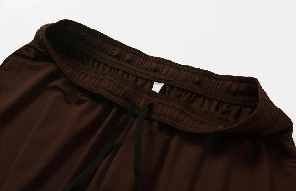 athletic shorts manufacturer dark brown mesh athletic shorts inner waistband and drawstring detail