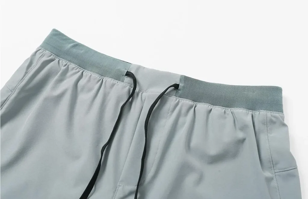 athletic shorts manufacturer light gray athletic shorts waistband and drawstring detail