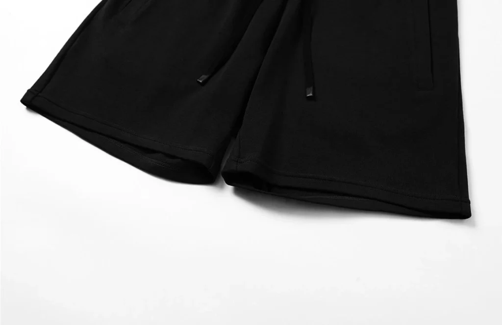 gym shorts manufacturer black cotton gym shorts hem and lining detail